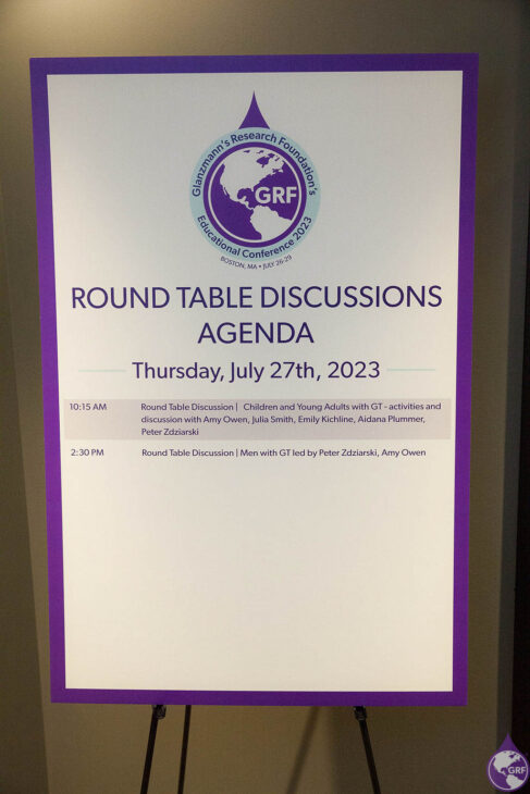 A sign that says round table discussions agenda related to glanzmann's thrombasthenia.