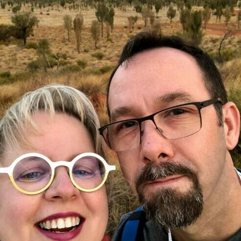 Eva Turek-Jewkes taking a selfie in front of Uluru.